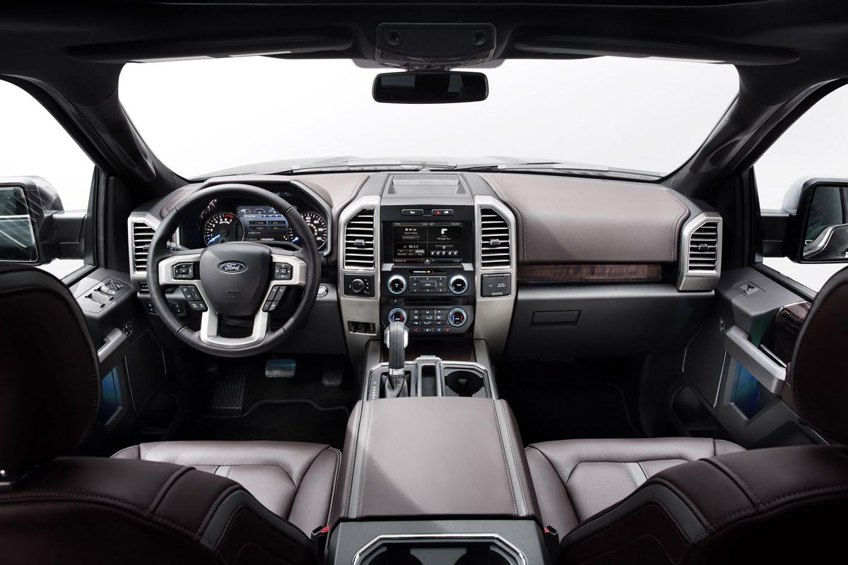 The interior is wider, the center console deeper, and storage under rear seat all add to the new mobil office. (Click to view larger.)