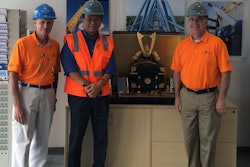 Blue Hat Crane accepts Kabuto helmet from Tadano America Corporation commemorating their new location and partnership. From left to right, Florian “Flo” Rothbrust, Blue Hat Crane senior vice president; Yo Kakinum, Tadano America president and COO; and Bob Jacquinot, Blue Hat Crane director of construction operations.