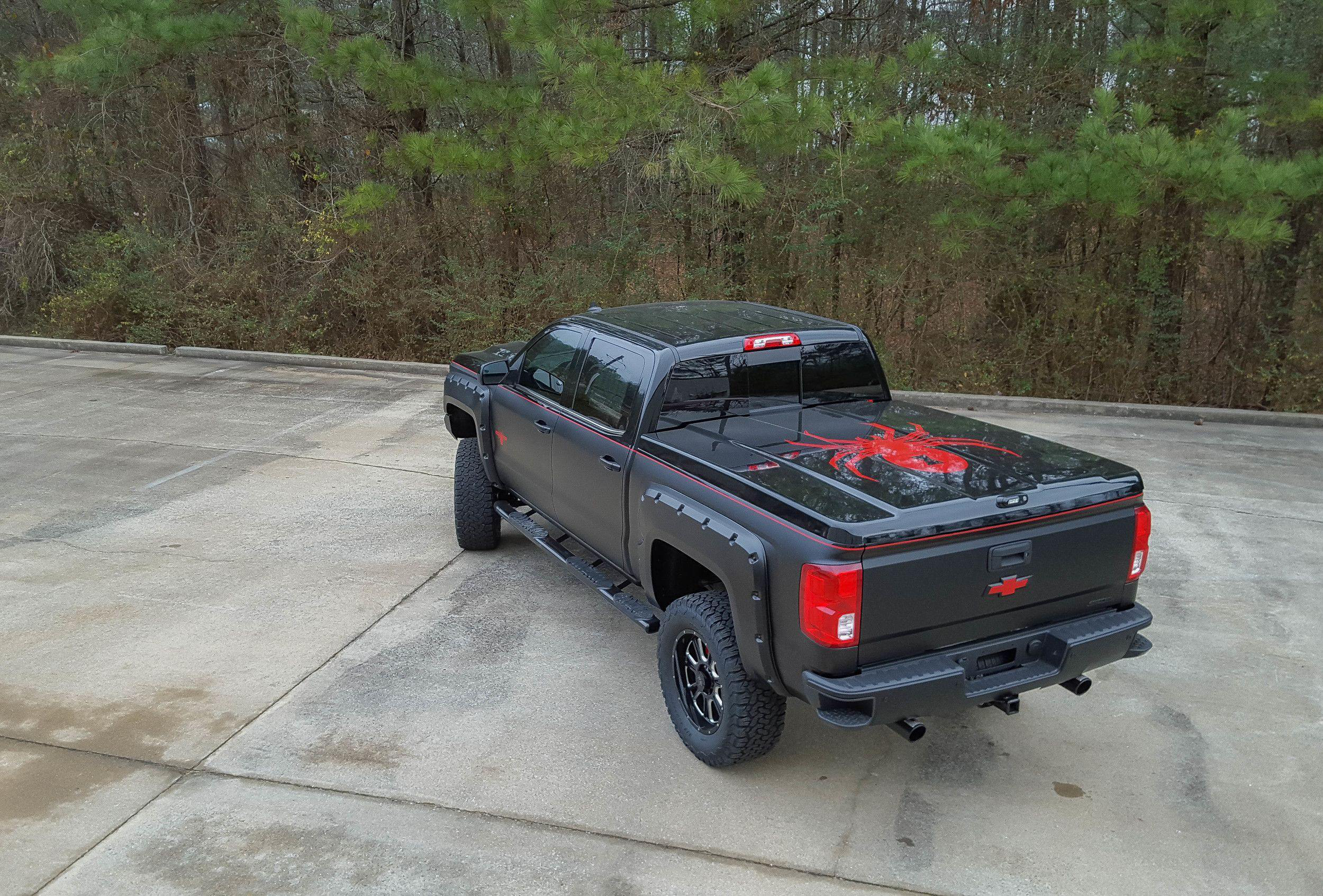 Black widow silverado with camper