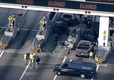 A CALTRANS worker was killled Saturday after a box truck broke through a crash barrier and slammed into a toll booth. (Screen shot of CBS News video shown below).