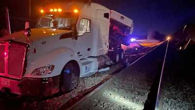 The driver of this 2014 Kenworth T680 exited the truck with his dog before the train struck the rig on the evening of Oct. 15 near Thackersville, Okla.