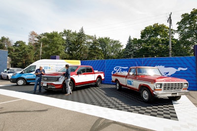 Jay Leno, left, and Walmart CEO John Furner revealed a one-off Ford F-150 Lightning built to honor late Walmart founder Sam Walton who drove a 1979 F-150 Custom shown on the right. Walton's actual truck remains on display at The Walmart Museum in Bentonville, Arkansas.