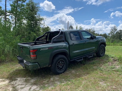 Tactical green on the 2022 Nissan Frontier Pro-4X is definitely at home in the woods.