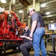 WyoTech student and instructor working on a diesel engine