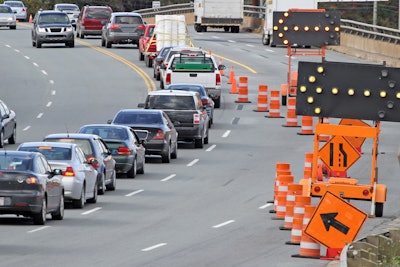 cars and trucks stuck in traffic