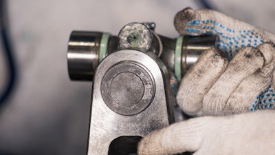 Replacing a universal joint on a heavy truck