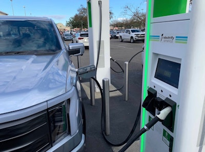 We mostly used Electrify America chargers during our 800-mile road trip throughout Florida. This one in Gainesville at a Target parking lot proved to be a tight fit. Parking poles made it tough opening the truck door.
