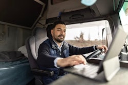 truck driver on computer